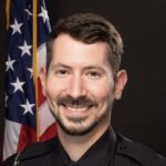 Officer Dustin Krish Hospitalized After Being Hit by Vehicle During Traffic Duty in Carrollton