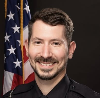 Officer Dustin Krish Hospitalized After Being Hit by Vehicle During Traffic Duty in Carrollton