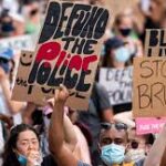 Thousands Rally Across U.S. in “Justice for All” Protests Demanding Police Accountability and Racial Equity